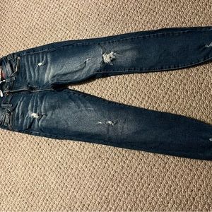 Dark washed distressed skinny jeans